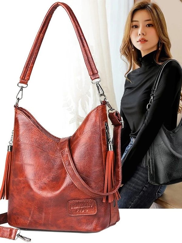 Simple fashion tassel female bag