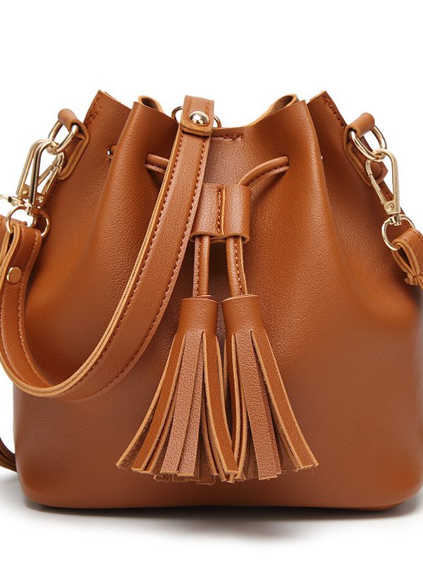 MS new Korean fashion shoulder belt buckle tassel satchel draw a bag on behalf of