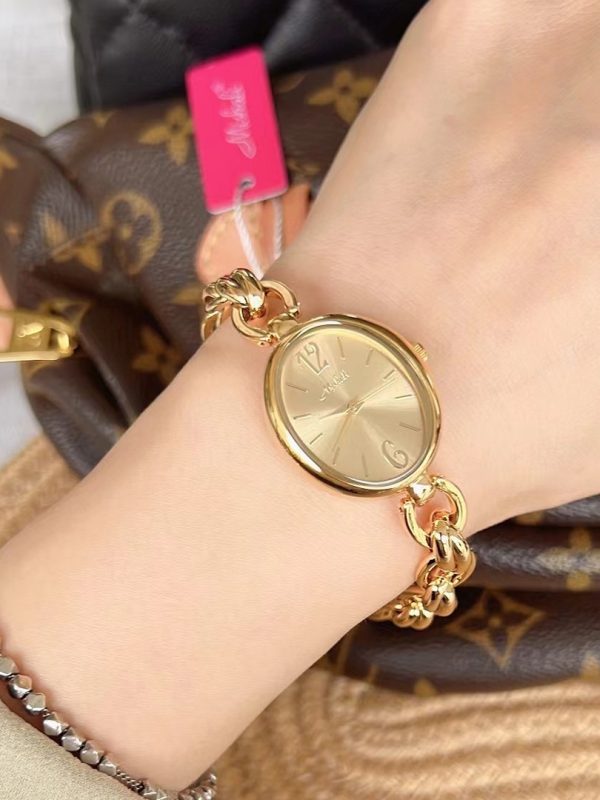 ساعة كوارتز نسائية بسوار فولاذي وسلسلة ذهبية بيضاوية مجوفة