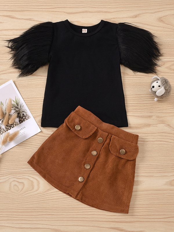 طقم تنورة من قماش الكوردروي بأزرار معدنية