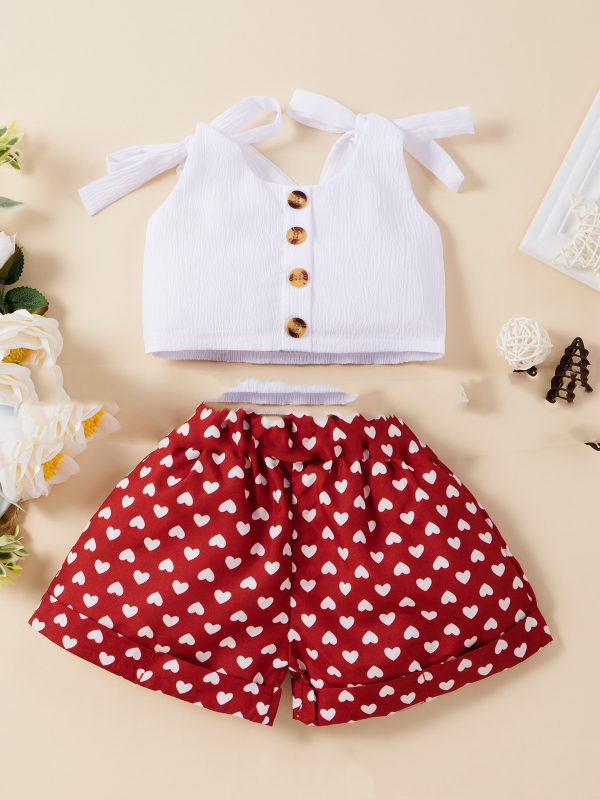 طقم قطعتين من أمازون بتصميم عصري أنيق، بلوزة بلون موحد وشورت قصير